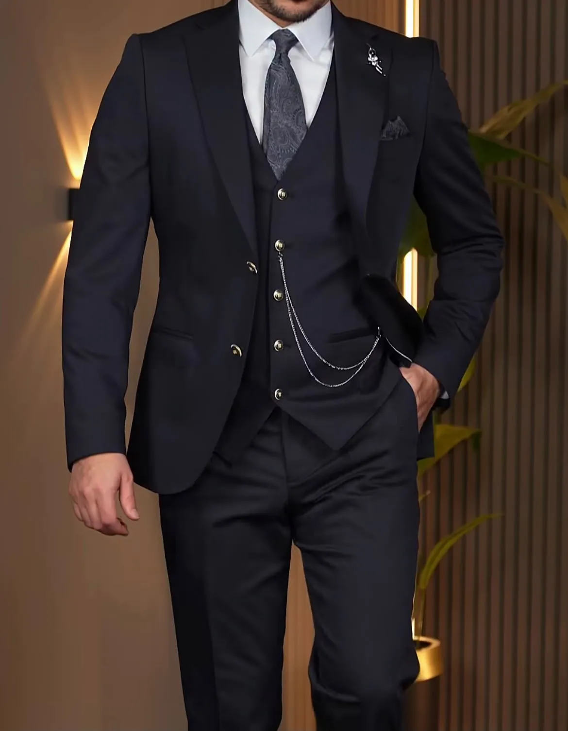 Tailored navy three-piece suit